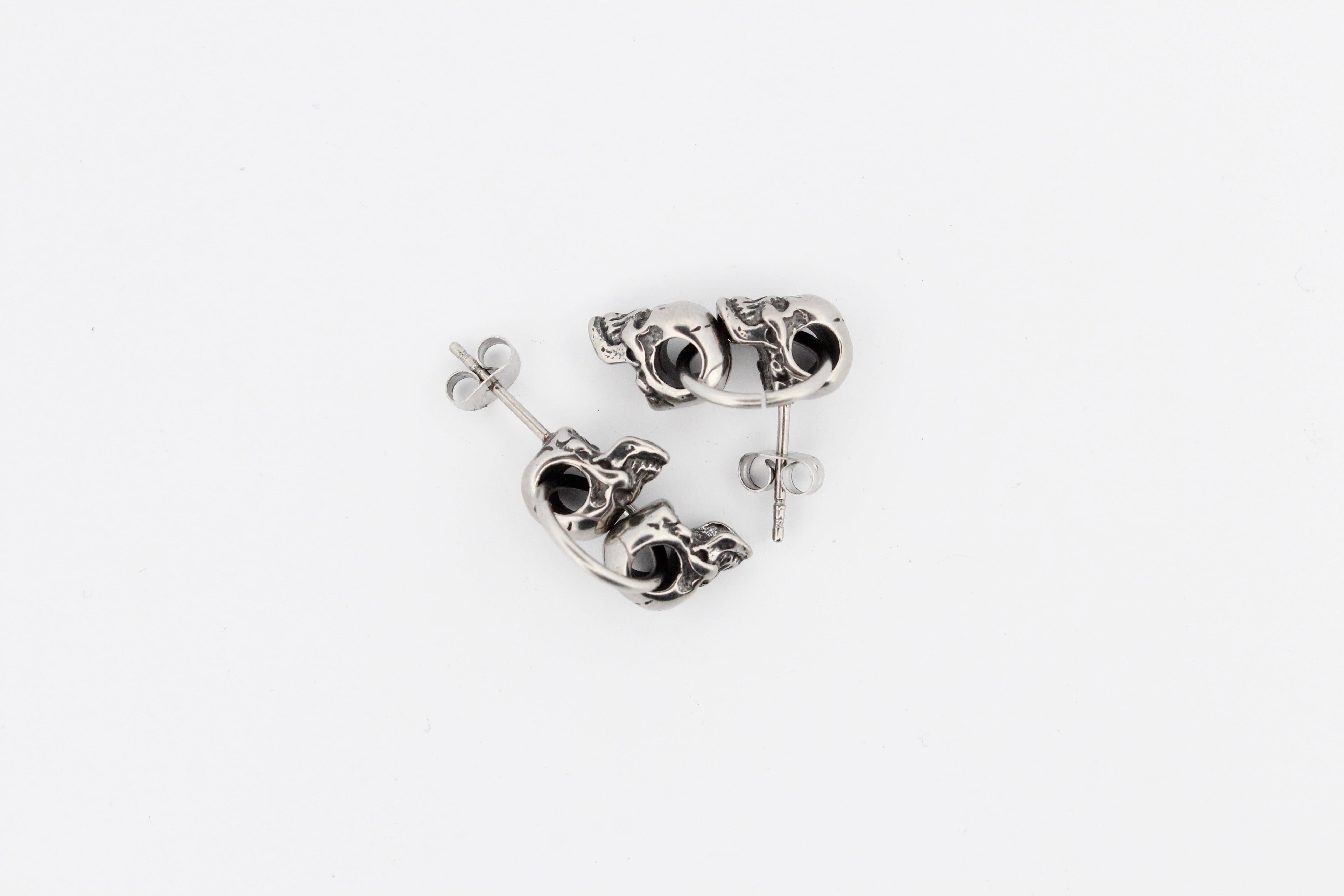 DOUBLE SKULL STUD EARRINGS