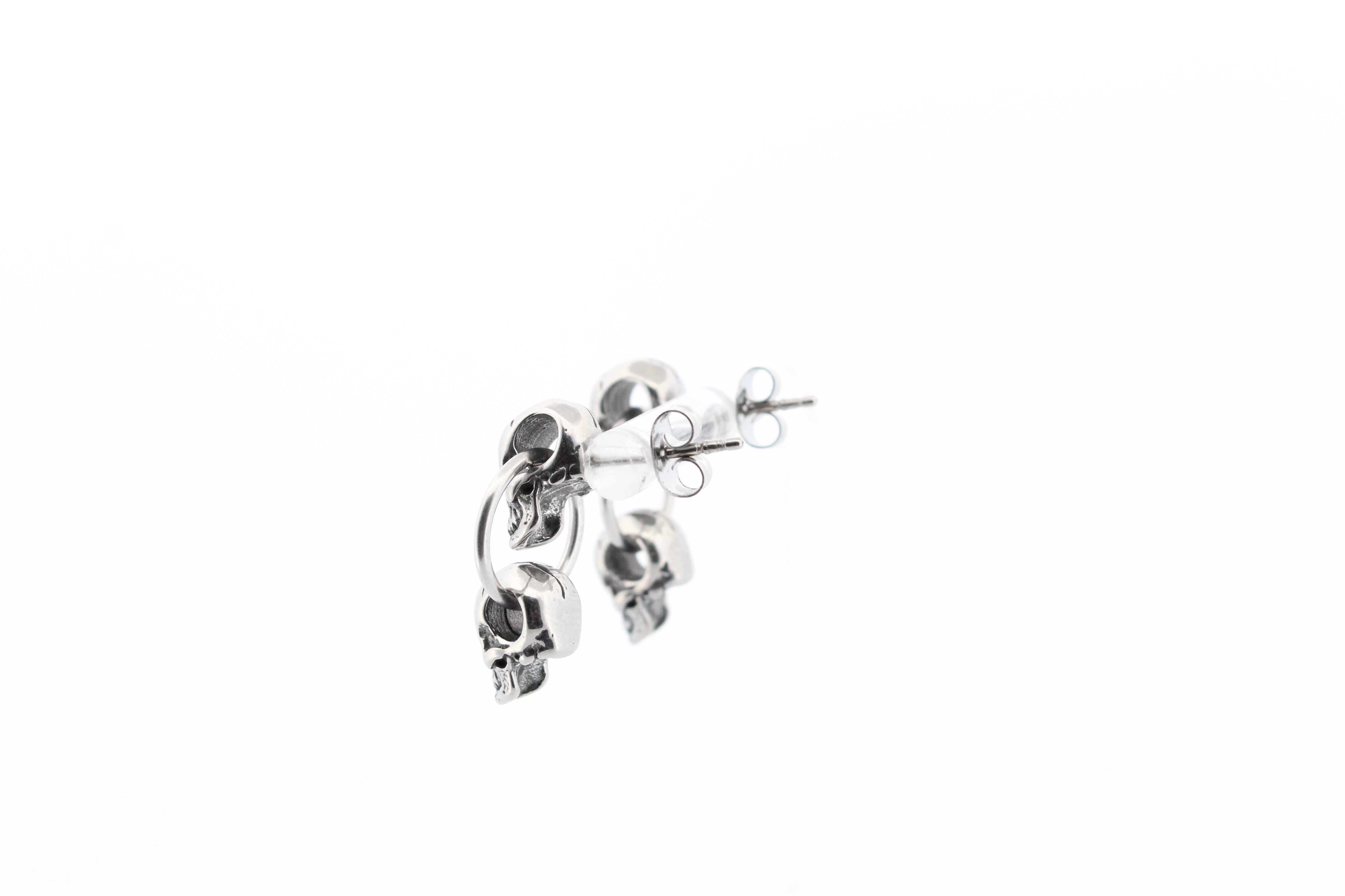 DOUBLE SKULL STUD EARRINGS