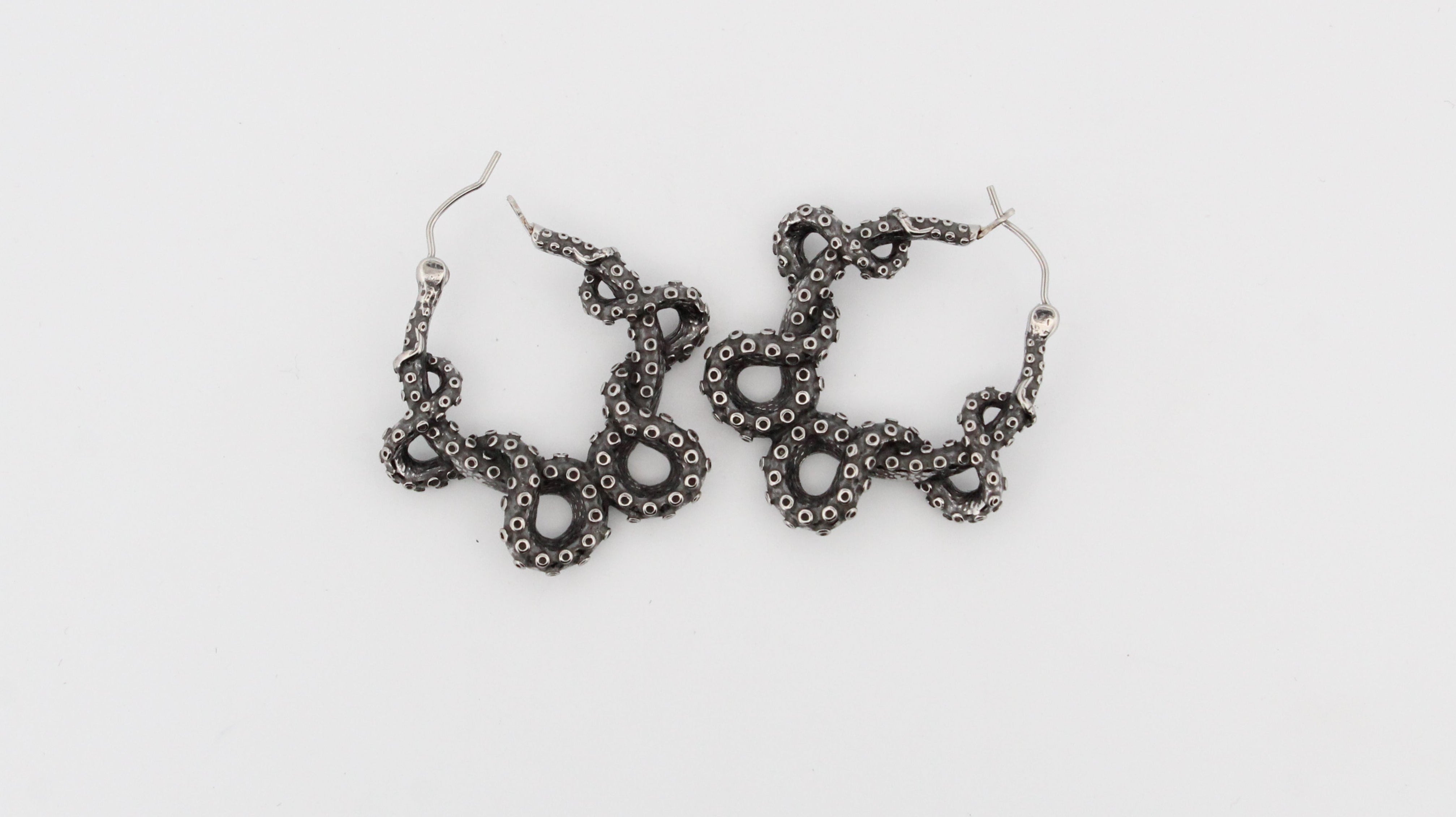 THE ABYSS LATCH EARRINGS