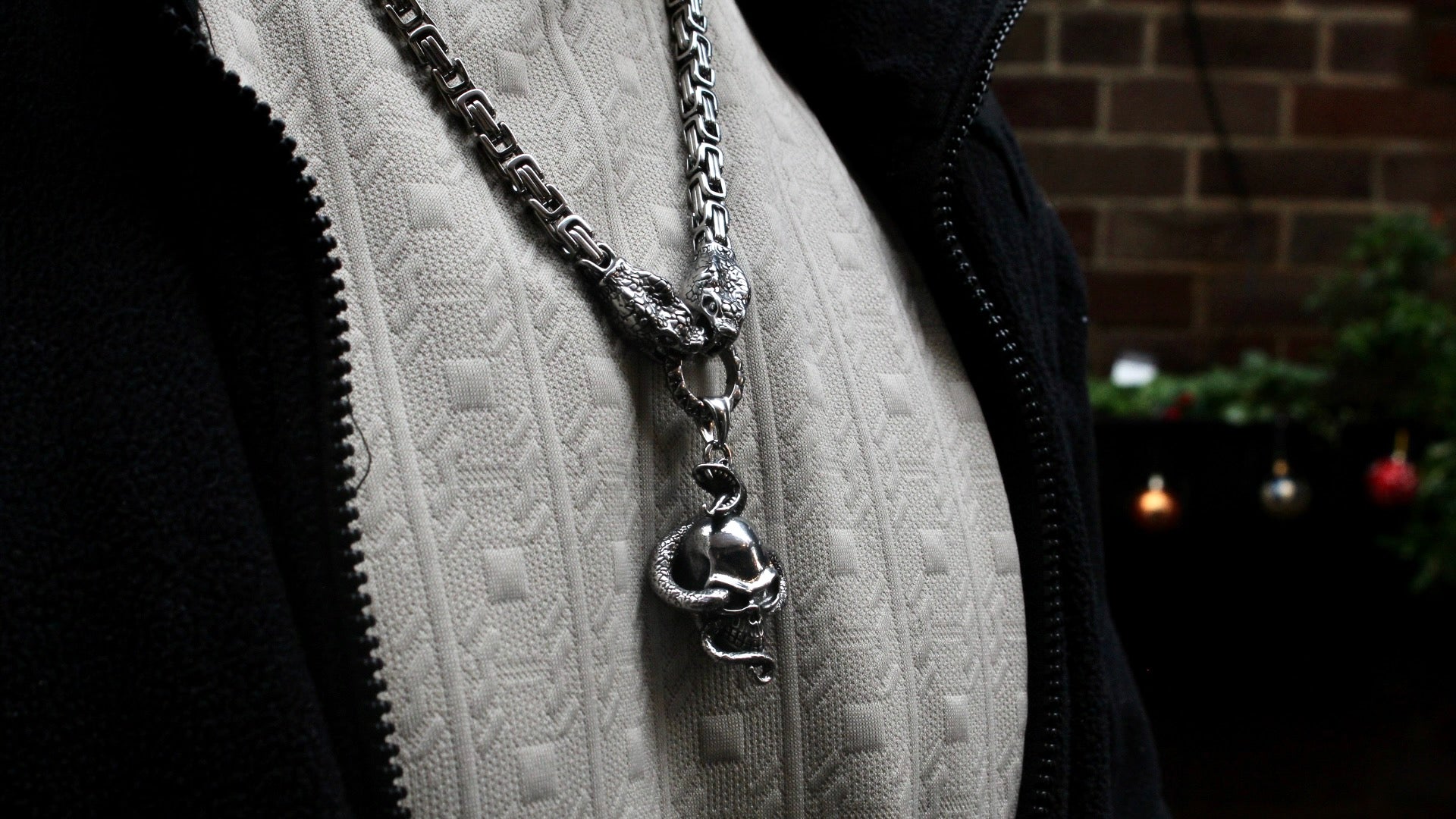 TWIN SERPENTS AND SKULL