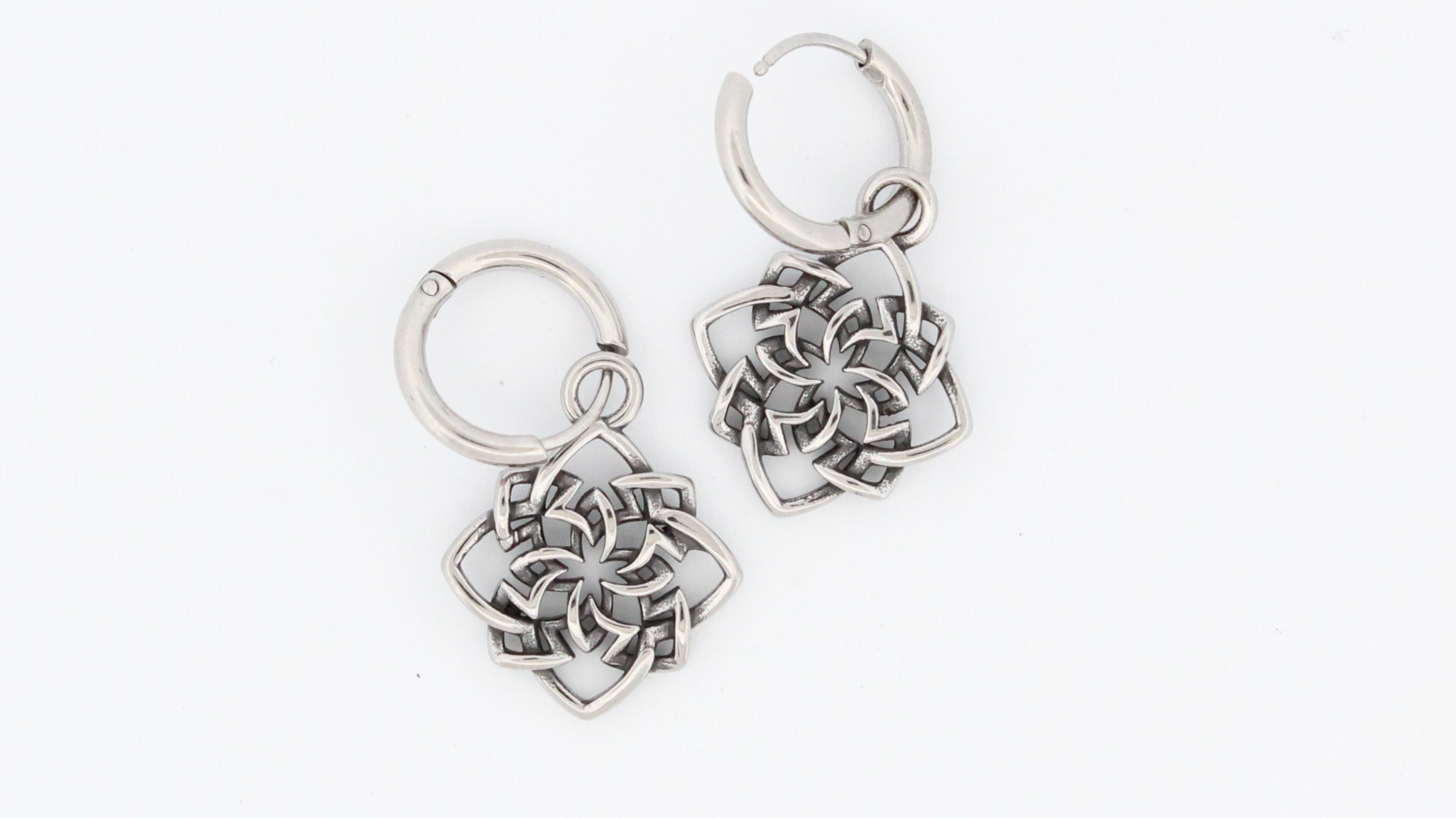 UNSOLVABLE HOOP EARRINGS